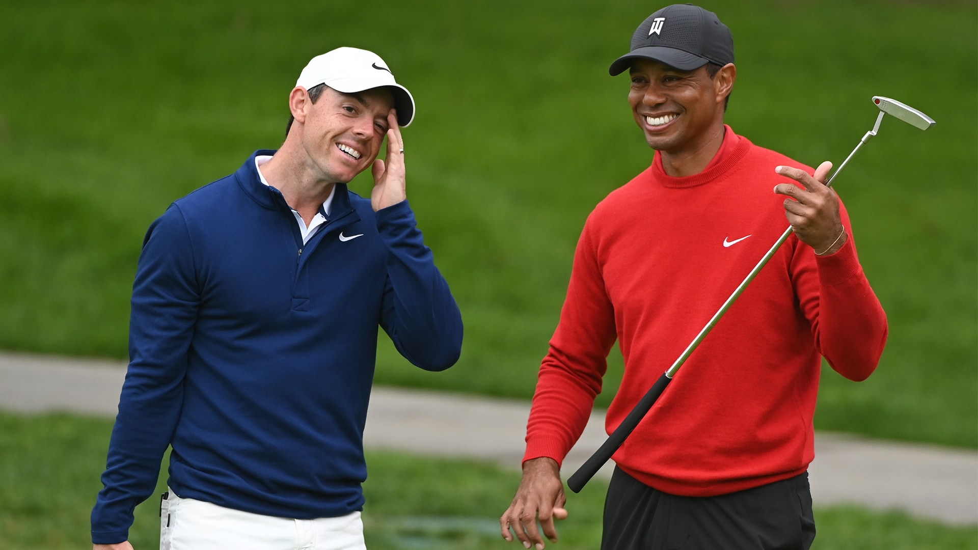 Rory and Tiger smiling together.